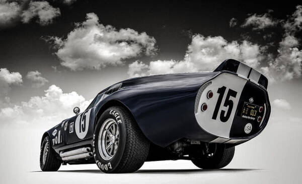 Vintage Race Car under Dramatic Sky Poster